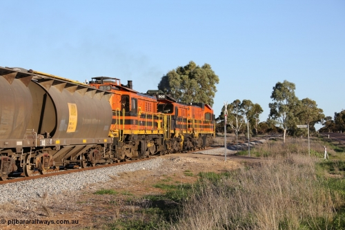 130703 0264
Kaldow, Port Lincoln bound loaded grain train crossing Loller Road grade crossing with EMD 1200 class 1204 leading two ALCo units, rebuilt 906 and 851. 3rd July 2013.
