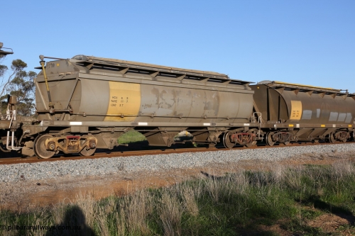 130703 0283
Kaldow, HCN type bogie grain hopper waggon HCN 6, originally an NHB type hopper built by Tulloch Ltd for the Commonwealth Railways North Australia Railway. One of forty rebuilt by Islington Workshops 1978-79 to the HCN type with a 36 ton rating, increased to 40 tonnes in 1984. Seen here loaded with grain with a Moose Metalworks roll-top cover.
Keywords: HCN-type;HCN6;SAR-Islington-WS;rebuild;Tulloch-Ltd-NSW;NHB-type;NHB1585;