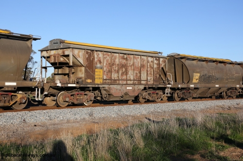 130703 0286
Kaldow, HBN type dual use ballast / grain hopper waggons, HBN 7. One of seventeen built by South Australian Railways Islington Workshops in 1968 with a 25 ton capacity, increased to 34 tons in 1974. HBN 1-11 fitted with removable tops and roll-top hatches in 1999-2000.
Keywords: HBN-type;HBN7;1968/17-7;SAR-Islington-WS;