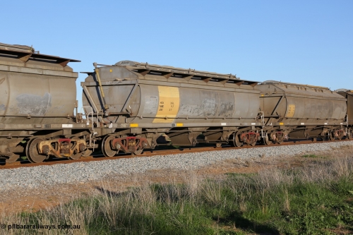 130703 0295
Kaldow, HCN type bogie grain hopper waggon HCN 26, originally an NHB type hopper built by Tulloch Ltd for the Commonwealth Railways North Australia Railway. One of forty rebuilt by Islington Workshops 1978-79 to the HCN type with a 36 ton rating, increased to 40 tonnes in 1984. Seen here loaded with grain with a Moose Metalworks roll-top cover.
Keywords: HCN-type;HCN26;SAR-Islington-WS;rebuild;Tulloch-Ltd-NSW;NHB-type;NHB1578;