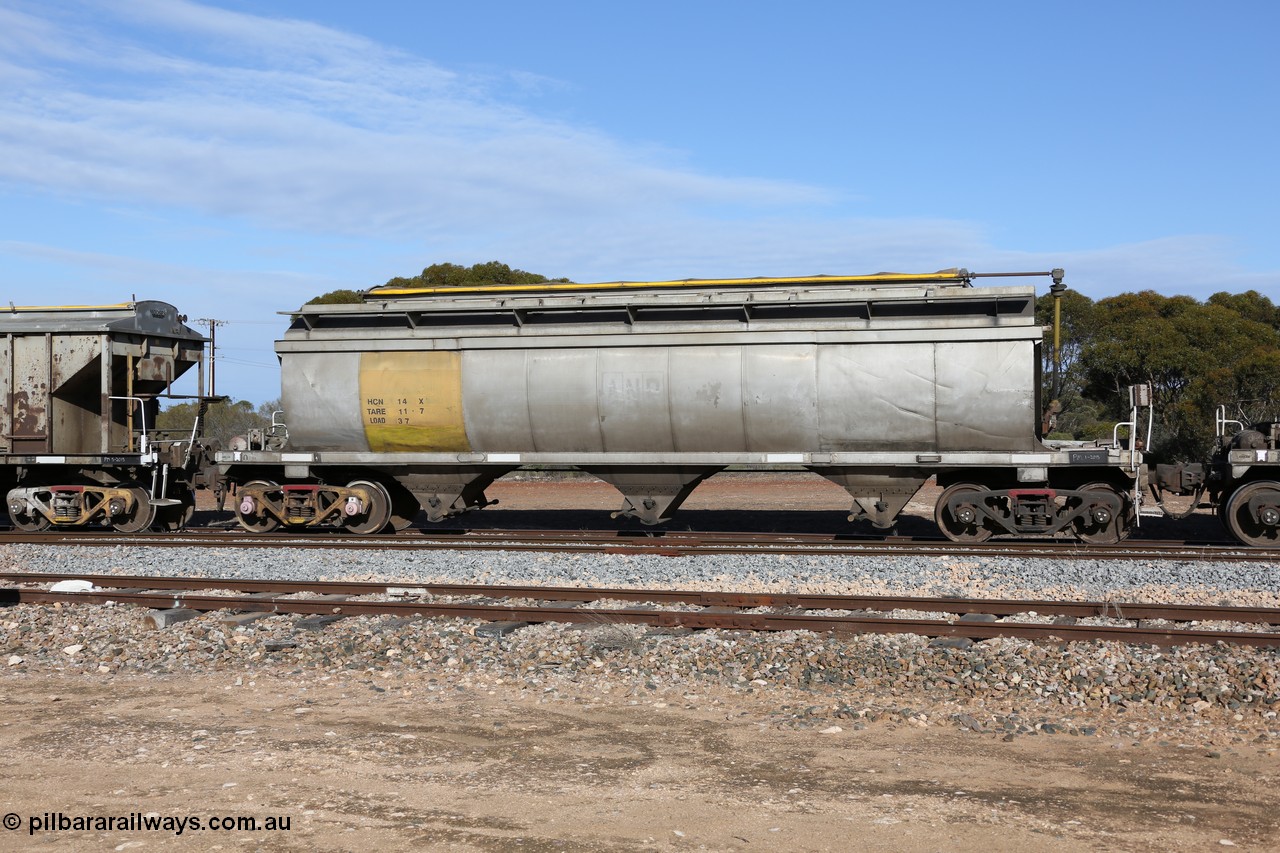 130704 0399
Kyancutta, HCN type bogie grain hopper waggon HCN 14, originally an NHB type hopper built by Tulloch Ltd for the Commonwealth Railways North Australia Railway. One of forty rebuilt by Islington Workshops 1978-79 to the HCN type with a 36 ton rating, increased to 40 tonnes in 1984. Seen here loaded with grain with a Moose Metalworks roll-top cover.
Keywords: HCN-type;HCN14;SAR-Islington-WS;rebuild;Tulloch-Ltd-NSW;NHB-type;NHB1597;