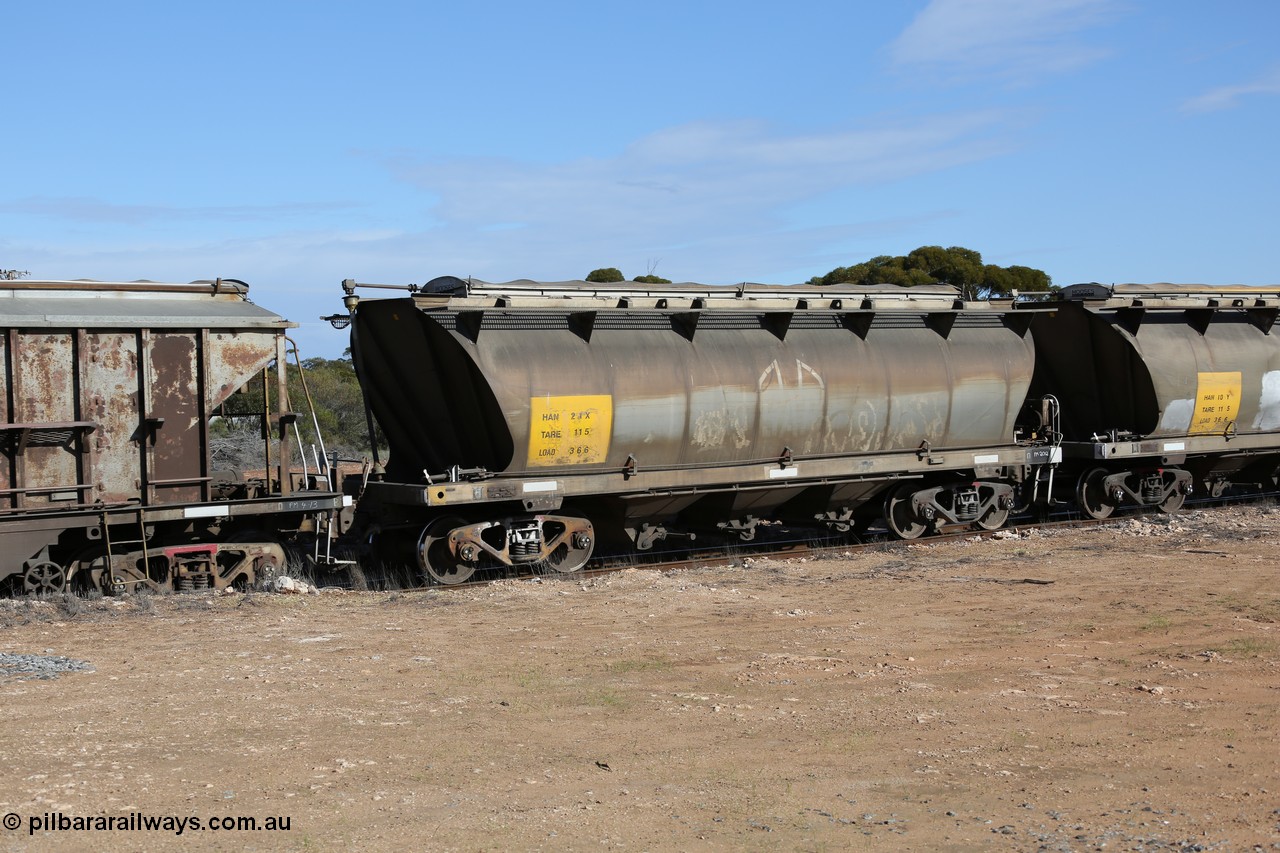 130704 0458
Kyancutta, HAN type bogie grain hopper waggon HAN 24, one of sixty eight units built by South Australian Railways Islington Workshops between 1969 and 1973 as the HAN type for the Eyre Peninsula system.
Keywords: HAN-type;HAN24;1969-73/68-24;SAR-Islington-WS;