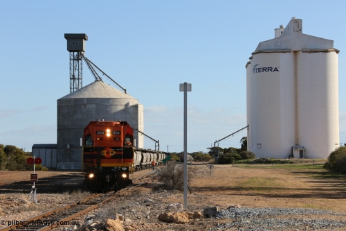 130704 0371
Kyancutta, south bound loaded grain train has stopped here to collect a loaded rack of fourteen grain waggons from the Ascom silo complex, Clyde Engineering built EMD G12C model 1204 serial 65-428 leads the train and was originally built in 1965 for Western Mining Corporation and operated by the WAGR as their A class A 1514.
Keywords: 1200-class;1204;Clyde-Engineering-Granville-NSW;EMD;G12C;65-428;A-class;A1514;