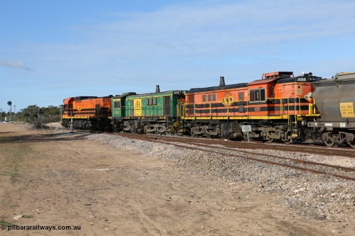 130704 0384
Kyancutta, south bound loaded grain train has stopped here to collect a loaded rack of grain waggons, seen here running out of the 'new grain siding' added in 1970 behind EMD 1204 and twin ALCo 830 units 873 and 851. July 4, 2006.
Keywords: 830-class;851;AE-Goodwin;ALCo;DL531;84137;