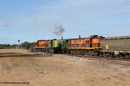 130704 0394
Kyancutta, south bound loaded grain train has stopped here to collect a loaded rack of grain waggons, seen here running out of the 'new grain siding' added in 1970 behind EMD 1204 and twin ALCo 830 units 873 and 851. July 4, 2006.
Keywords: 830-class;851;AE-Goodwin;ALCo;DL531;84137;