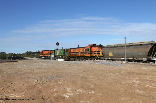 130704 0415
Kyancutta, south bound loaded grain train has stopped here to collect a loaded rack of grain waggons, seen here backing up to re-join the rest of the train on the mainline as it crosses the Eyre Highway grade crossing and one of only three electric signals on the network, behind EMD 1204 and twin ALCo 830 units 873 and 851. July 4, 2006.
Keywords: 830-class;851;AE-Goodwin;ALCo;DL531;84137;