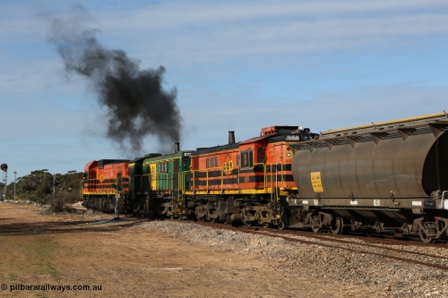 130704 0419
Kyancutta, south bound loaded grain train has stopped here to collect a loaded rack of grain waggons, seen here backing up to re-join the rest of the train on the mainline with one of only three electric signals on the network, behind EMD 1204 and twin ALCo 830 units 873 and 851. July 4, 2006.
Keywords: HAN-type;HAN54;1969-73/68-54;SAR-Islington-WS;