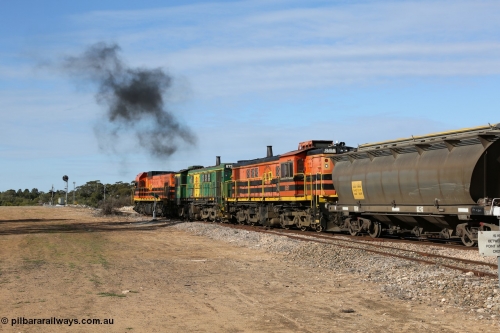 130704 0420
Kyancutta, south bound loaded grain train has stopped here to collect a loaded rack of grain waggons, seen here backing up to re-join the rest of the train on the mainline with one of only three electric signals on the network, behind EMD 1204 and twin ALCo 830 units 873 and 851. July 4, 2006.
Keywords: 830-class;851;AE-Goodwin;ALCo;DL531;84137;