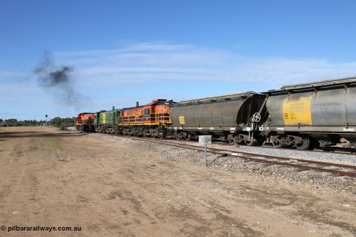 130704 0421
Kyancutta, south bound loaded grain train has stopped here to collect a loaded rack of grain waggons, seen here backing up to re-join the rest of the train on the mainline with one of only three electric signals on the network with the original goods siding closest to the camera, behind EMD 1204 and twin ALCo 830 units 873 and 851. July 4, 2006.
Keywords: HAN-type;HAN54;1969-73/68-54;SAR-Islington-WS;