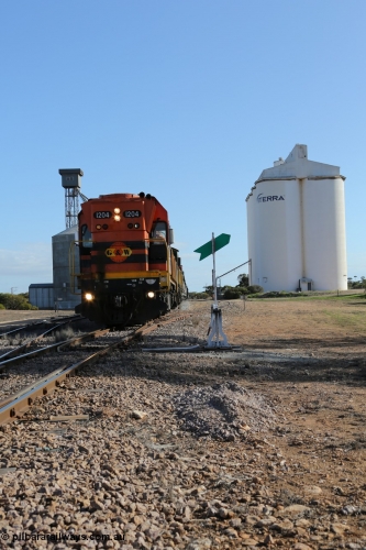 130704 0432
Kyancutta, 1200 class unit 1204 wearing current owner Genesee & Wyoming livery is a Clyde Engineering built EMD G12C model with serial 65-428 heads up a loaded grain train as it undertakes a brake test following shunting to attach a further fourteen waggons. 4th July 2013.
Keywords: 1200-class;1204;Clyde-Engineering-Granville-NSW;EMD;G12C;65-428;A-class;A1514;