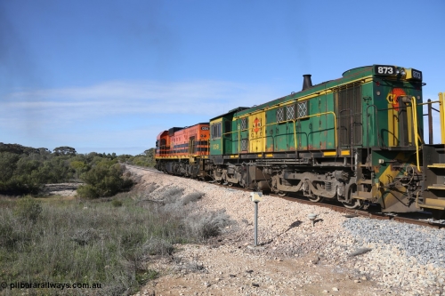 130704 0448
Kyancutta, second unit former Australian National narrow gauge 830 class locomotive 873, an AE Goodwin built ALCo DL531 model with serial G3422-3 built new for the SAR in 1966 and delivered new to Port Lincoln in April 1966 with current owner decals for G&W, it has spent it's whole working life on the Eyre Peninsula. 4th July 2013.
Keywords: 830-class;873;AE-Goodwin;ALCo;DL531;G3422-3;