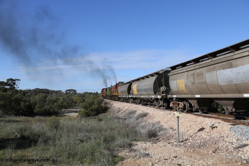 130704 0451
Kyancutta, as the train powers away south two examples of the SAR built HAN type of bogie grain waggons lead the front of the rake, sixty eight units were built by South Australian Railways Islington Workshops between 1969 and 1973 for the Eyre Peninsula system with the third waggon being an HCN type converted by SAR Islington Workshops between 1978-79 from Tulloch Ltd NSW built NHB type iron ore waggons. 4th July 2013.
Keywords: HAN-type;HAN7;1969-73/68-7;SAR-Islington-WS;
