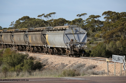 130704 0485
Kyancutta, the rear of a south bound loaded grain as it departs with the final four waggons all HCN type bogie grain hoppers converted by SAR Islington Workshops from Tulloch Ltd NSW built NHB type hopper waggons. 4th July 2013.
Keywords: HCN-type;HCN40;SAR-Islington-WS;rebuild;Tulloch-Ltd-NSW;NHB-type;NHB1596;