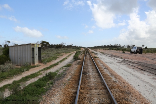 130704 0489
Moule, yard overview looking west, Moule located at the 445.6 km was opened in February 1966 when the Direct Line between Ceduna and Kevin was opened. From the left is the Mallee style shelter shed, mainline, crossing loop and ballast siding. [url=https://goo.gl/maps/KTtpy7LJB4tmHaTt6]Location is here[/url]. 4th July 2013.
