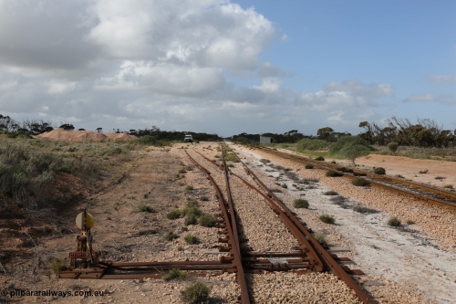 130704 0492
Moule, yard view looking east from the points for the single ended ballast siding with ballast pile of the left. Moule located at the 445.6 km was opened in February 1966 when the Direct Line between Ceduna and Kevin was opened. It hosts a crossing loop and ballast loading siding, [url=https://goo.gl/maps/14Xf9VRbSC6hkoQz5]Location is here[/url]. 4th July 2013.
