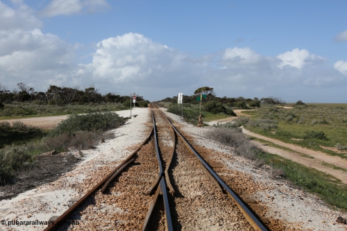 130704 0500
Moule, looking east at the east end points for the crossing loop, grade crossing is for access to ballast stockpile area, Moule located at the 445.6 km was opened in February 1966 when the Direct Line between Ceduna and Kevin was opened. [url=https://goo.gl/maps/oQR5WeuKACFTMBKC9]Location is here[/url]. 4th July 2013.
