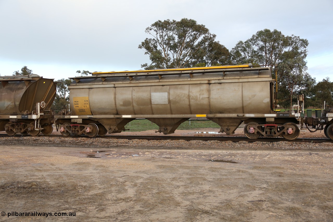 130705 0558
Lock, HCN type bogie grain hopper waggon HCN 9, originally an NHB type hopper NHB 1024 built by Tulloch Ltd for the Commonwealth Railways North Australia Railway. One of forty rebuilt by Islington Workshops 1978-79 to the HCN type with a 36 ton rating, increased to 40 tonnes in 1984. Fitted with a Moose Metalworks roll-top cover. 5th July 2013.
Keywords: HCN-type;HCN9;SAR-Islington-WS;rebuild;Tulloch-Ltd-NSW;NHB-type;NHB1024;