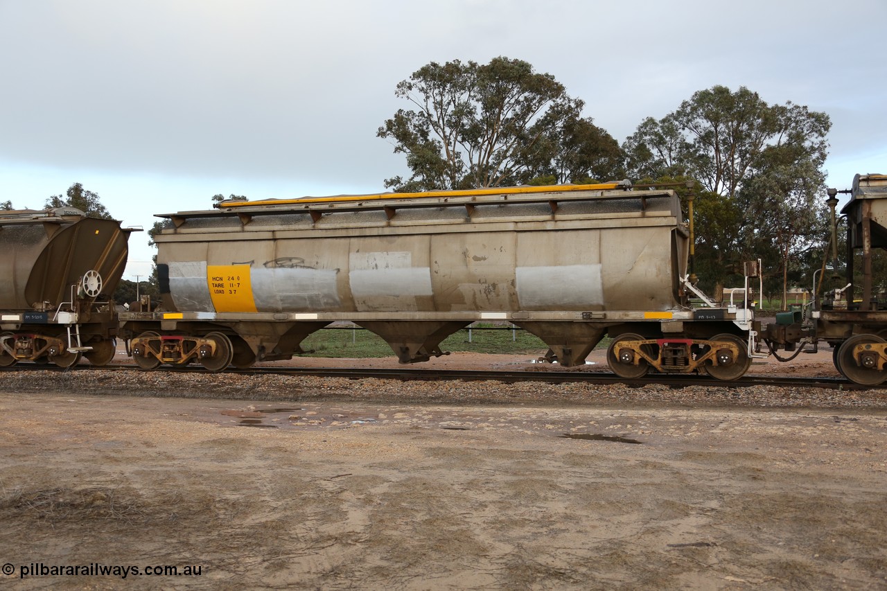 130705 0562
Lock, HCN type bogie grain hopper waggon HCN 24, originally an NHB type hopper NHB 1575 built by Tulloch Ltd for the Commonwealth Railways North Australia Railway. One of forty rebuilt by Islington Workshops 1978-79 to the HCN type with a 36 ton rating, increased to 40 tonnes in 1984. Fitted with a Moose Metalworks roll-top cover. 5th July 2013.
Keywords: HCN-type;HCN24;SAR-Islington-WS;rebuild;Tulloch-Ltd-NSW;NHB-type;NHB1575;
