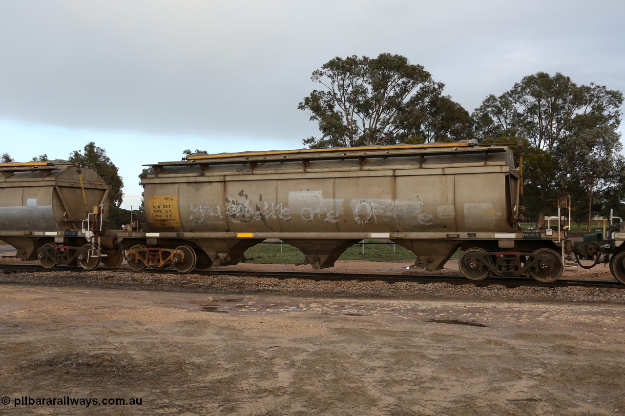 130705 0573
Lock, HCN type bogie grain hopper waggon HCN 36, originally an NHB type hopper NHB 1592 built by Tulloch Ltd for the Commonwealth Railways North Australia Railway. One of forty rebuilt by Islington Workshops 1978-79 to the HCN type with a 36 ton rating, increased to 40 tonnes in 1984. Fitted with a Moose Metalworks roll-top cover. 5th July 2013.
Keywords: HCN-type;HCN36;SAR-Islington-WS;rebuild;Tulloch-Ltd-NSW;NHB-type;NHB1592;