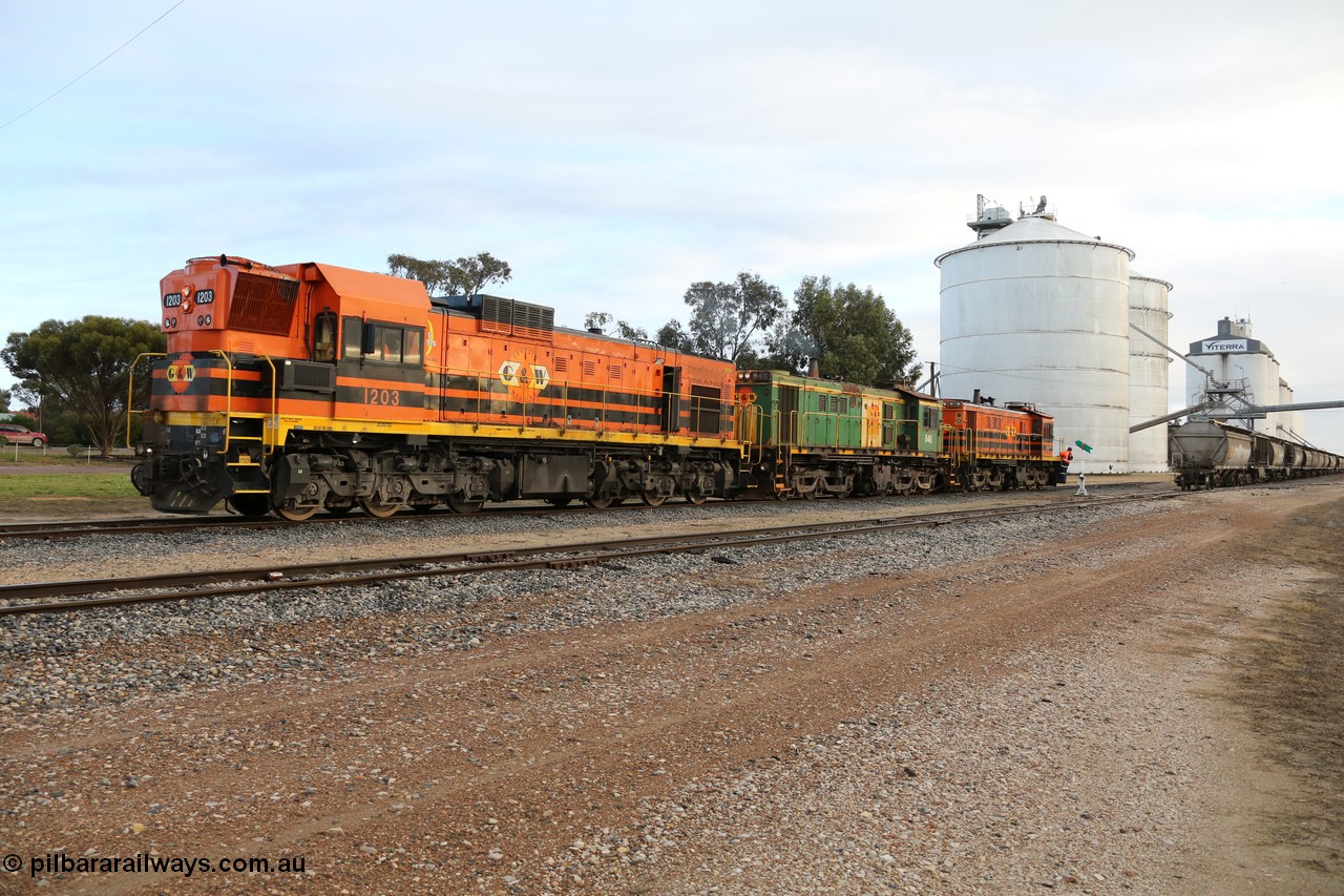 130705 0592
Lock, having stowed the loaded portion on the mainline, the three locos 1203, 846 and 859 shunt back on to the empty portion on goods siding #1. 
Keywords: 1200-class;1203;Clyde-Engineering-Granville-NSW;EMD;G12C;65-427;A-class;A1513;
