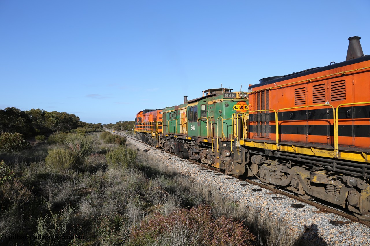 130705 0657
Lock, 1203, 846 and 859 depart along the mainline for Port Lincoln with the loaded grain train.
