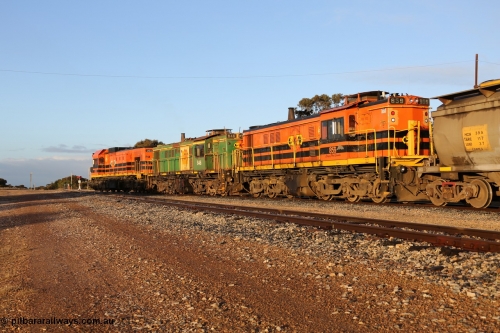 130705 0523
Lock, 1203, 846 and 859 shunt their loading grain train out of the siding onto the mainline. Genesee & Wyoming locomotive AE Goodwin ALCo model DL531 unit 859 'City of Port Lincoln' serial 84705, built in 1963, 859 started life at Peterborough, spent some years in Tasmania and even spent time in Perth on standard gauge in 2002 before being repainted and transferred to the Eyre Peninsula system in 2003. 5th of July 2013.
Keywords: 830-class;859;AE-Goodwin;ALCo;DL531;84705;