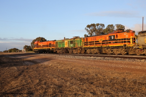 130705 0527
Lock, 1203, 846 and 859 shunt their loading grain train out of the siding onto the mainline. Genesee & Wyoming locomotive AE Goodwin ALCo model DL531 unit 859 'City of Port Lincoln' serial 84705, built in 1963, 859 started life at Peterborough, spent some years in Tasmania and even spent time in Perth on standard gauge in 2002 before being repainted and transferred to the Eyre Peninsula system in 2003. 5th of July 2013.
Keywords: 830-class;859;AE-Goodwin;ALCo;DL531;84705;