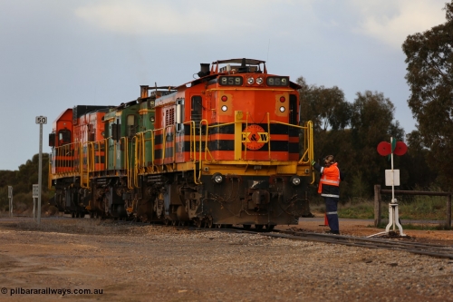 130705 0588
Lock, having stowed the loaded portion on the mainline, the three locos 859, 846 and 1203 shunt back on to the empty portion on goods siding #1. 
Keywords: 830-class;859;AE-Goodwin;ALCo;DL531;84705;