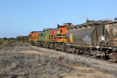130705 0652
Lock, 1203, 846 and 859 shunt back into the yard with the second loaded portion, HAN type bogie grain hopper waggon HAN 59, one of sixty eight units built by South Australian Railways Islington Workshops between 1969 and 1973 as the HAN type for the Eyre Peninsula system.
