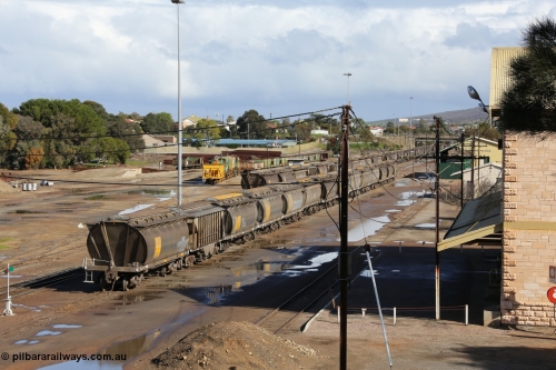 130706 0670
Port Lincoln, looking in the down direction from the London Street overbridge at the yard environs with the station at right which was Eyre Peninsula 'head offices'. 6th of July 2013.
