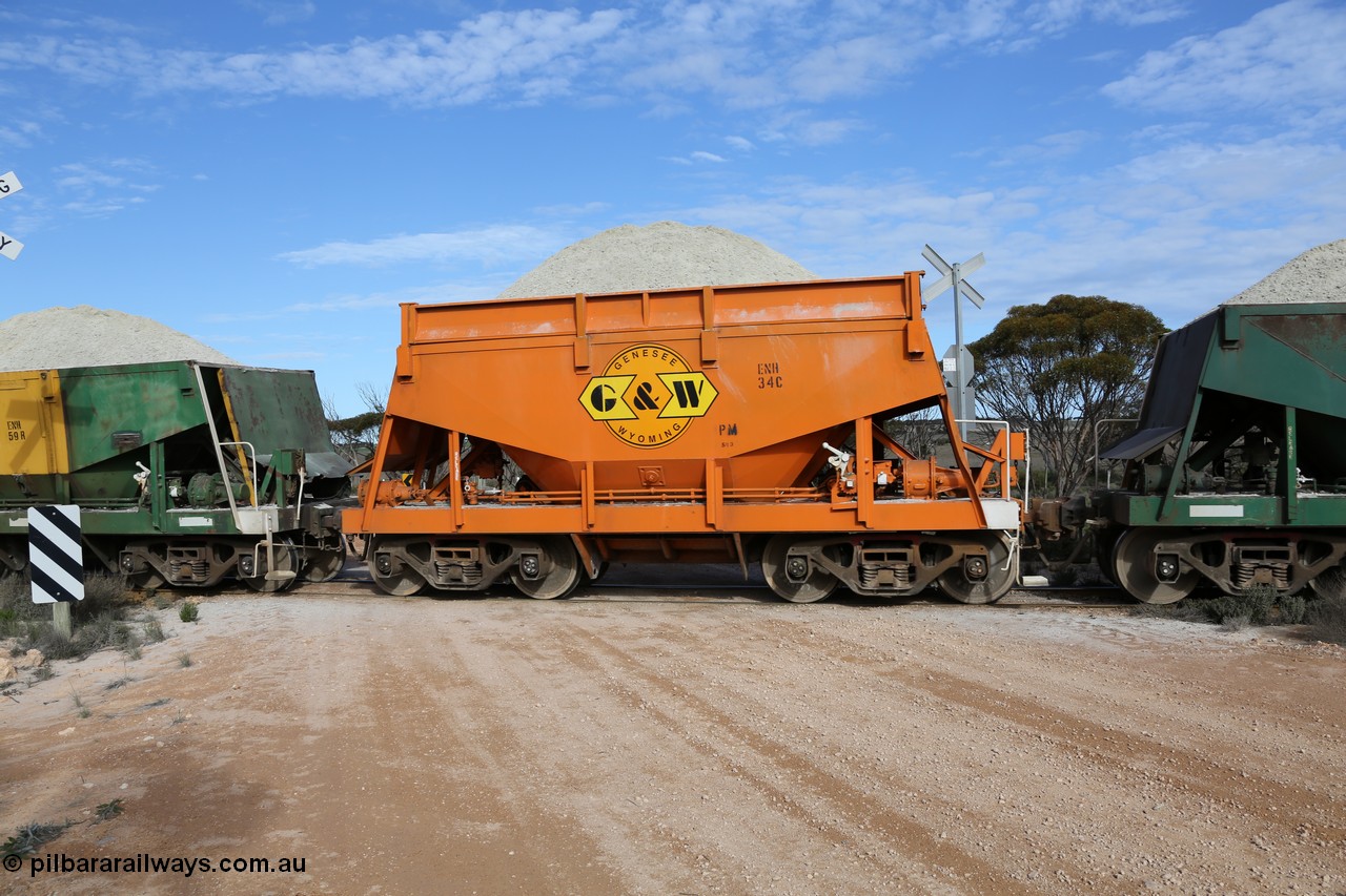 130708 0744
Charra, originally an Kinki Sharyo built NH type for the NAR now coded ENH type ENH 34, in GWA corporate orange livery of owner Genesee & Wyoming Australia, still with hungry boards loaded with gypsum, [url=https://goo.gl/maps/fnkK0]Charoban Rd grade crossing, 477.8 km[/url].
Keywords: ENH-type;ENH34;Kinki-Sharyo-Japan;NH-type;NH934;
