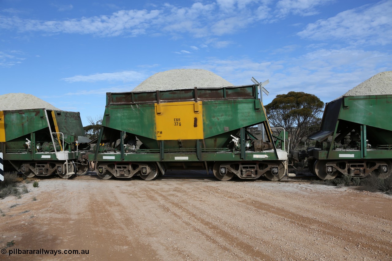 130708 0756
Charra, originally an Kinki Sharyo built NH type for the NAR now coded ENH type ENH 37 G, with hungry boards still fitted loaded with gypsum, [url=https://goo.gl/maps/fnkK0]Charoban Rd grade crossing, 477.8 km[/url].
Keywords: ENH-type;ENH37;Kinki-Sharyo-Japan;NH-type;NH937;