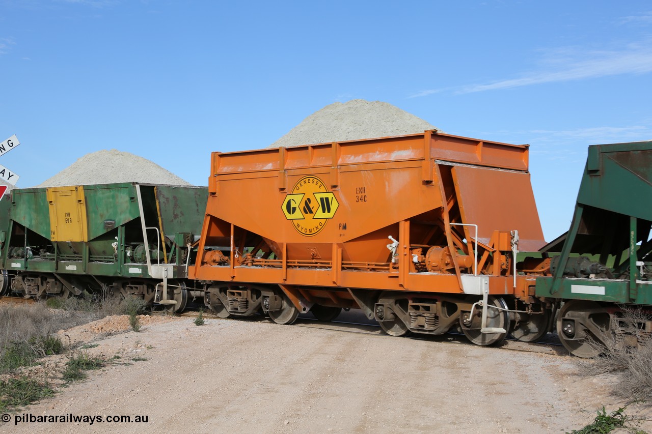 130708 0824
Moule, originally an Kinki Sharyo built NH type for the NAR now coded ENH type ENH 34, in GWA corporate orange livery of owner Genesee & Wyoming Australia, still with hungry boards loaded with gypsum, [url=https://goo.gl/maps/SWBMW]Mewett Rd grade crossing, 470.1 km[/url].
Keywords: ENH-type;ENH34;Kinki-Sharyo-Japan;NH-type;NH934;