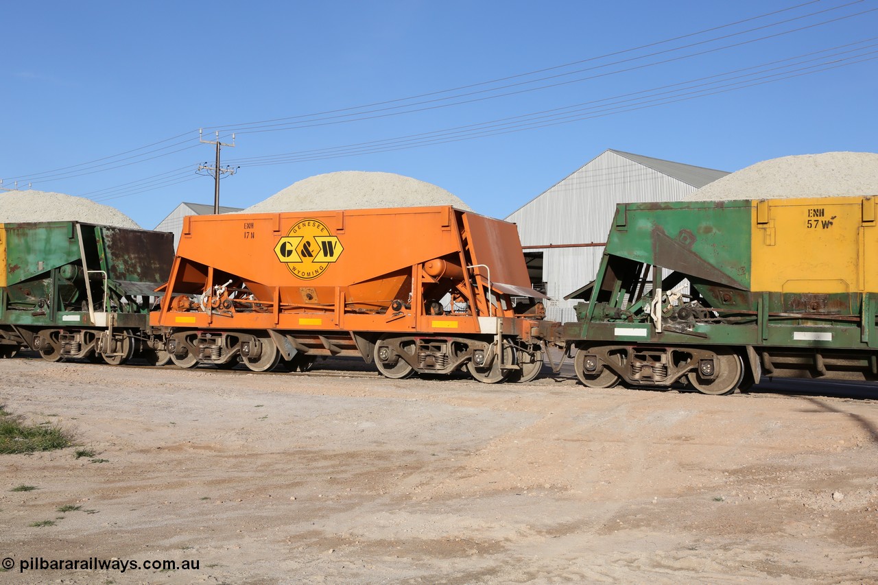 130708 0922
Thevenard originally an Kinki Sharyo built NH type for the NAR now coded ENH type ENH 17 in GWA corporate orange livery of owner Genesee & Wyoming Australia, without hungry boards loaded with gypsum crossing [url=https://goo.gl/maps/dgQdX]Bergmann Drive grade crossing, 434.2 km[/url].
Keywords: ENH-type;ENH17;Kinki-Sharyo-Japan;NH-type;NH917;