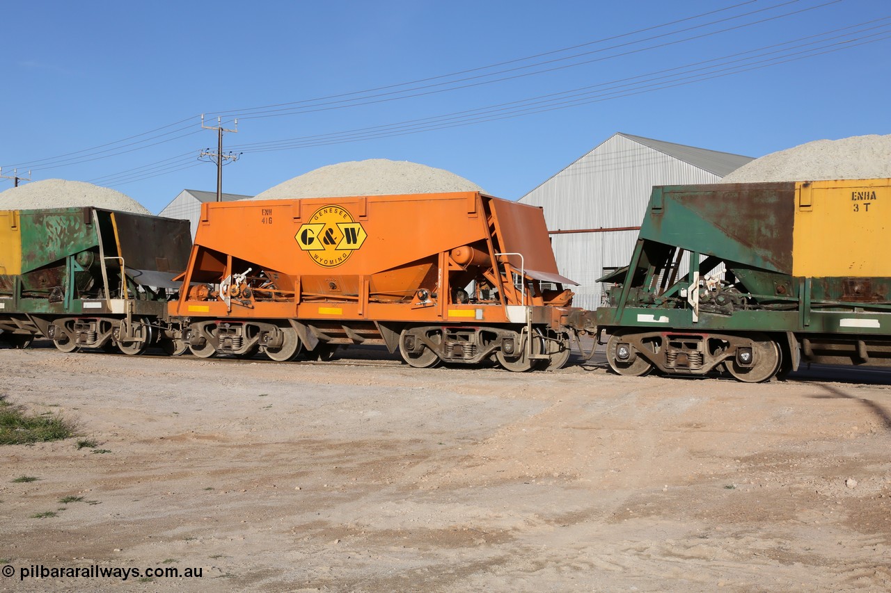 130708 0927
Thevenard originally an Kinki Sharyo built NH type for the NAR now coded ENH type ENH 41 in GWA corporate orange livery of owner Genesee & Wyoming Australia, without hungry boards loaded with gypsum crossing [url=https://goo.gl/maps/dgQdX]Bergmann Drive grade crossing, 434.2 km[/url].
Keywords: ENH-type;ENH41;Kinki-Sharyo-Japan;NH-type;NH941;