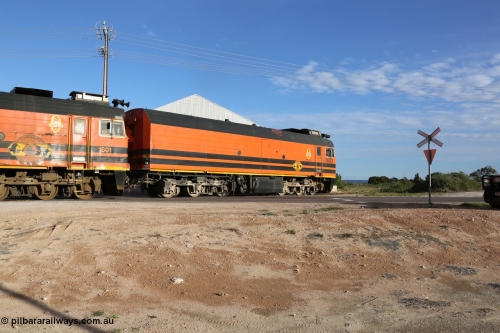 130708 0882
Thevenard, loaded train running through the back of the yard and crossing [url=https://goo.gl/maps/dgQdX]Bergmann Drive grade crossing, 434.2 km[/url].
