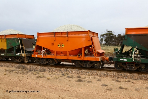 161109 1917
Moule, originally built by Kinki Sharyo as the NH type for the NAR in 1968, sent to Port Lincoln in 1978, then rebuilt and recoded ENH type in 1984, ENH 23, refurbished and wearing current owner Genesee & Wyoming orange with small decal with matching hungry boards loaded with gypsum.
Keywords: ENH-type;ENH23;Kinki-Sharyo-Japan;NH-type;NH923;