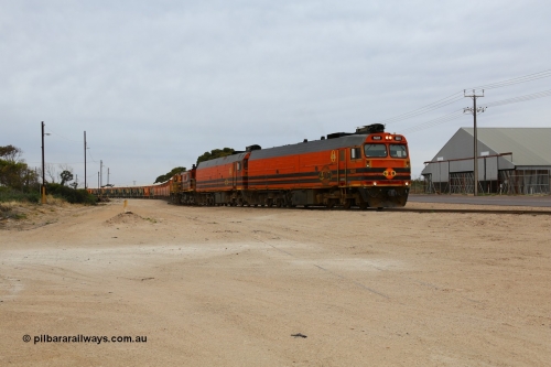161109 1969
Thevenard, train 4DD4 enters the yard behind Genesee & Wyoming locomotives Clyde Engineering EMD model JL22C unit 1601 serial 71-728 and 1603 serial 71-730 as they negotiate the yard to the GRA siding balloon for unloading.
Keywords: 1600-class;1601;Clyde-Engineering-Granville-NSW;EMD;JL22C;71-728;NJ-class;NJ1;