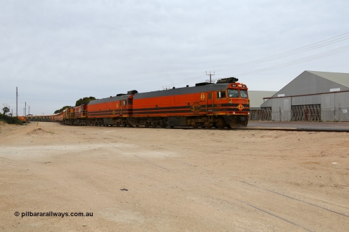 161109 1970
Thevenard, train 4DD4 enters the yard behind Genesee & Wyoming locomotives Clyde Engineering EMD model JL22C unit 1601 serial 71-728 and 1603 serial 71-730 as they negotiate the yard to the GRA siding balloon for unloading.
Keywords: 1600-class;1601;Clyde-Engineering-Granville-NSW;EMD;JL22C;71-728;NJ-class;NJ1;