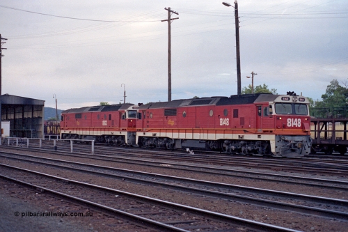 100-09
Albury yard, NSWSRA standard gauge 81 class 8148 Clyde Engineering EMD model JT26C-2SS serial 84-1067 and 8163 serial 84-1082, candy livery.
Keywords: 81-class;8148;Clyde-Engineering-Kelso-NSW;EMD;JT26C-2SS;84-1067;8163;84-1082;