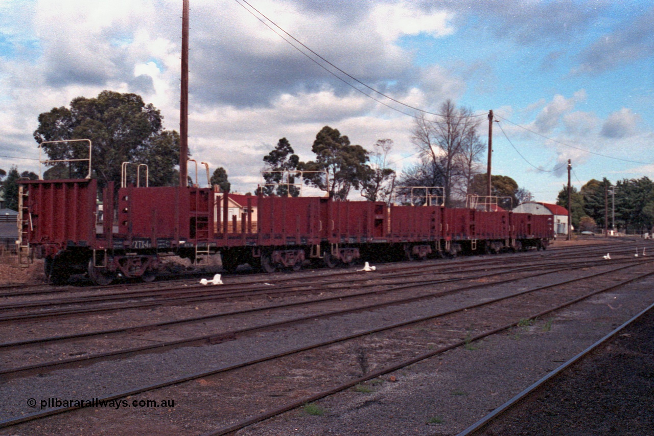 101-15
Maryborough yard view, four broad gauge V/Line VZTX type bogie manual discharge sleeper waggons VZTX 4, started out as BP type Steel Mail/Baggage Van BP 7 built in 1959 by Newport Workshops, went on to become VBAX 17 in 1979, then converted September 1988 at Bendigo Workshops to VZTX type.
Keywords: VZTX-type;VZTX4;Victorian-Railways-Newport-WS;BP-type;VBAX-type;