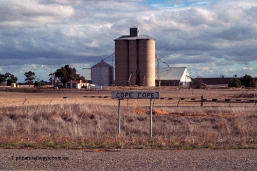 101-18
Cope Cope Geelong style silo complex with steel annex and horizontal grain bunker overview.
