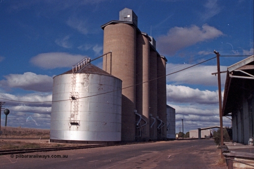 101-20
Donald Geelong style silo complex with steel annex overview, Freightgate canopy in background, goods shed at right, town water tower in distant background.
