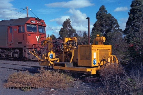 101-24
Donald loco depot, V/line asset number 6-35-135 track machine, possibly spike puller, V/Line G class G 528 Clyde Engineering EMD model JT26C-2SS serial 88-1258.
Keywords: G-class;G528;Clyde-Engineering-Somerton-Victoria;EMD;JT26C-2SS;88-1258;