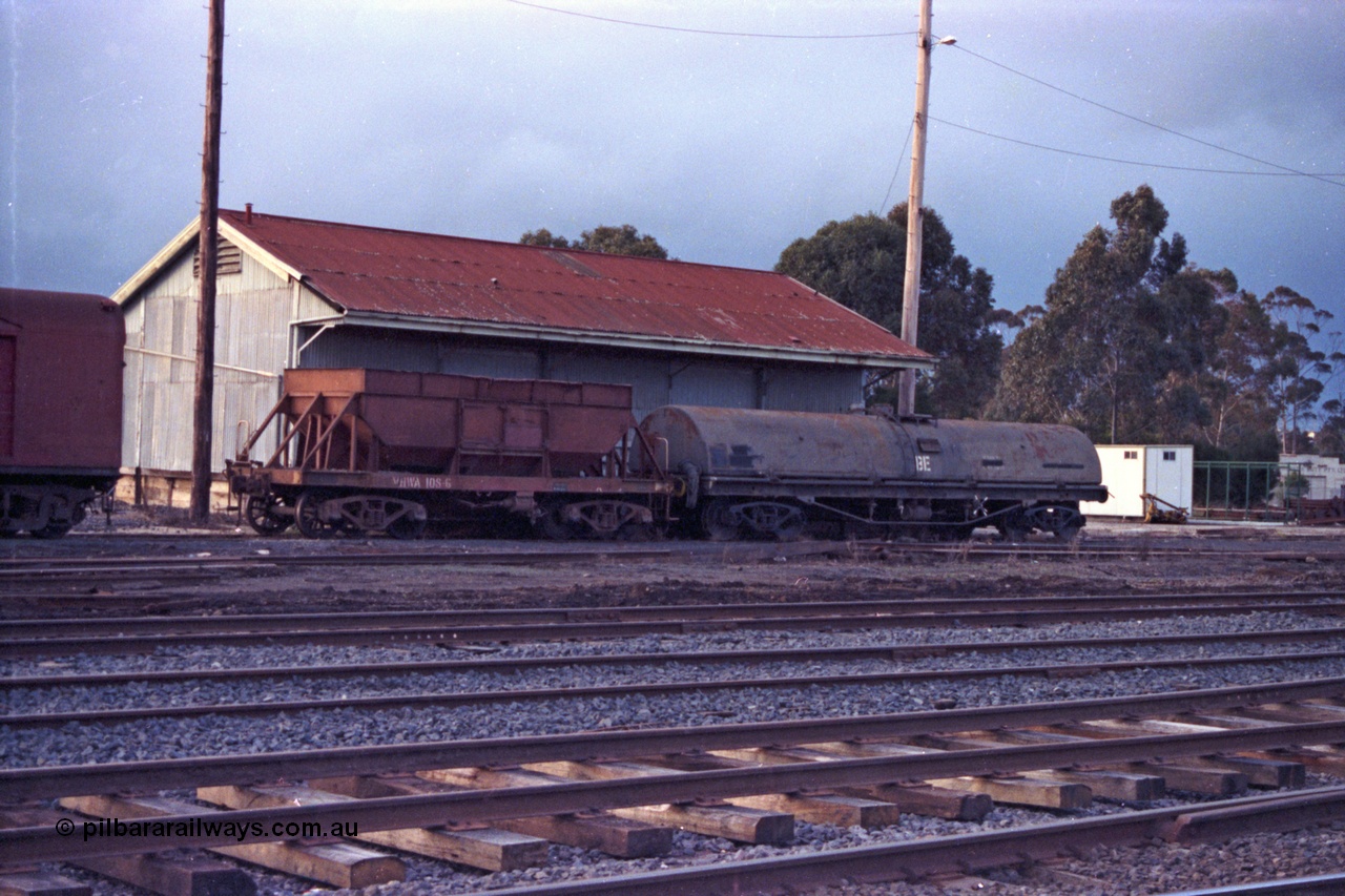 103-35
Seymour yard view, broad gauge VHWA type bogie ballast waggon VHWA 108, originally built by Victorian Railways Newport Workshops in January 1951 as an NN type ballast hopper waggon and recoded in 1979 to VHWA, NSWGR BE type water gin, goods shed behind them, new track laid in foreground.
Keywords: VHWA-type;VHWA108;Victorian-Railways-Newport-WS;NN-type;BE-type;