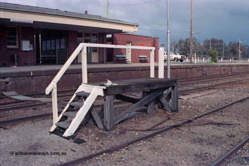 103-03
Springhurst station building overview, staff exchange platform and walkway across tracks, apparatus set up gauge laying on No.3 Rd.
