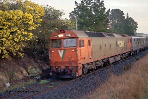 106-12
Kilmore East, V/Line standard gauge G class loco G 518 Clyde Engineering EMD model JT26C-2SS serial 85-1231 with the up Melbourne Express, off focus.
Keywords: G-class;G518;Clyde-Engineering-Rosewater-SA;EMD;JT26C-2SS;85-1231;