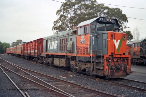 106-20
Seymour broad gauge passenger stabling yard, V/Line P class P 21 Clyde Engineering EMD model G18HBR serial 84-1214 rebuilt from flat-top T class T 338 Clyde Engineering EMD model G8B serial 56-114 with D van and orange 'Tea Cup' liveried H set SH 28.
Keywords: P-class;P21;Clyde-Engineering-Somerton-Victoria;EMD;G18HBR;84-1214;rebuild;