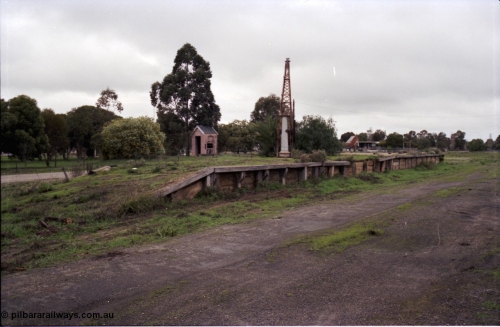 107-11
Tongala station yard, goods platform and loading crane, weighbridge scale room in background.
