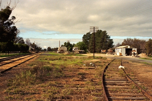 108-30
Tatura, station yard overview, looking south, station building, goods shed, super phosphate shed.
